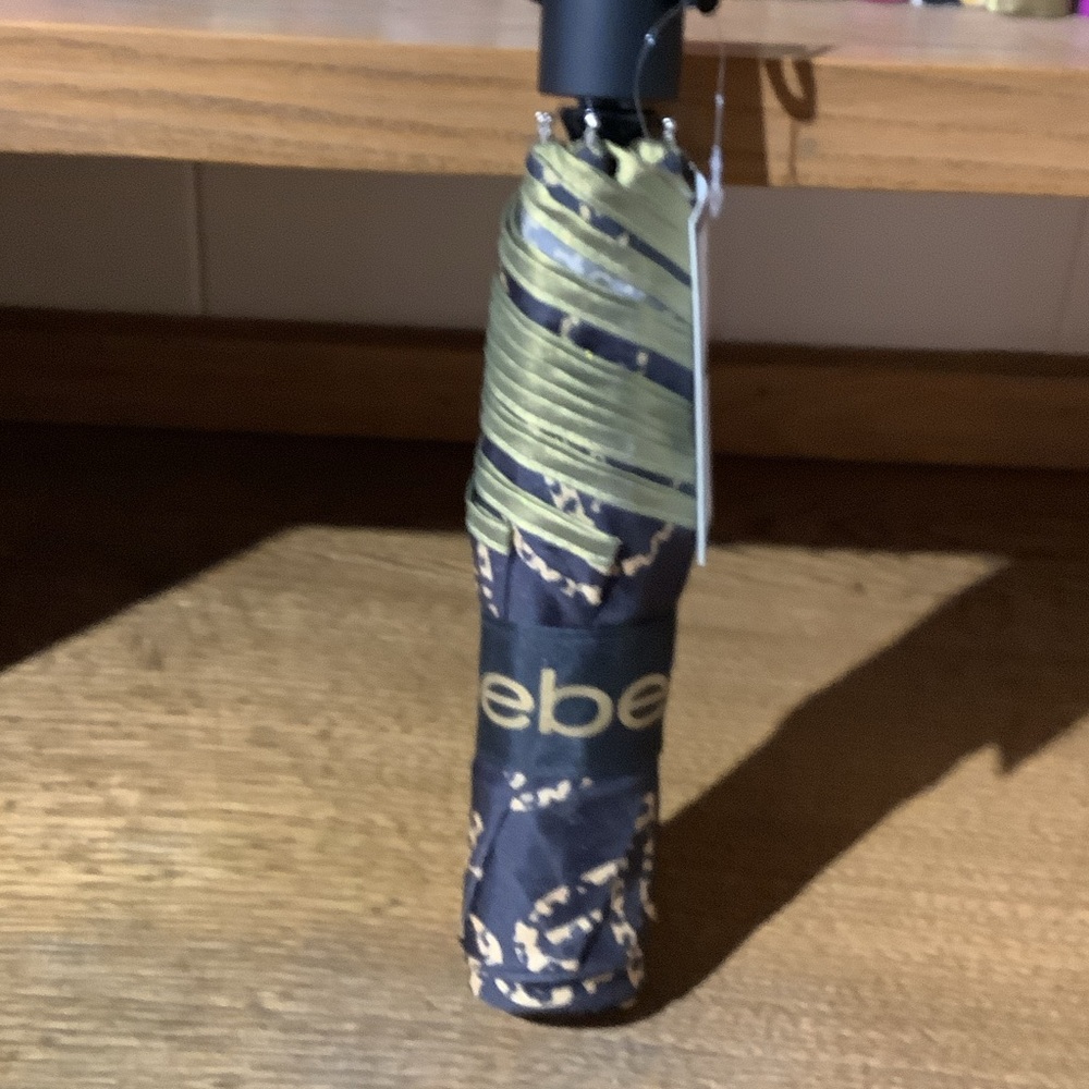 Bebe Black, Gold & cheetah Patterned Umbrella.